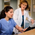Marketing Photo of Doctor consulting Assistant