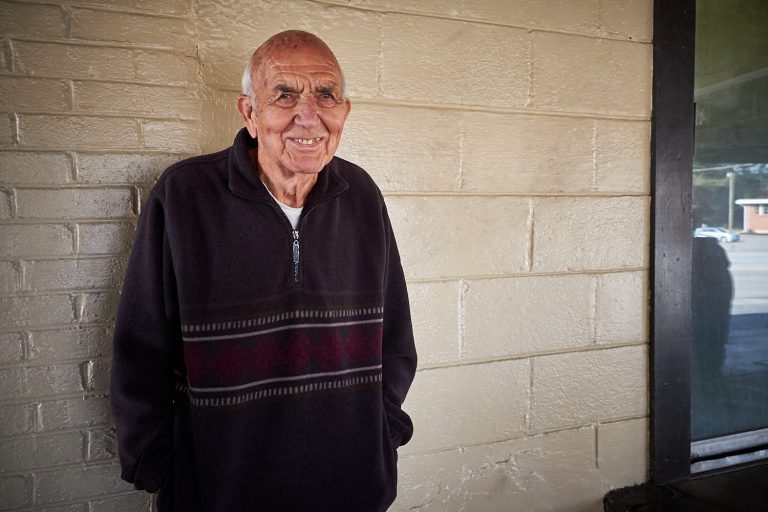 Jack Holcomb, Holcomb's Used Cars,